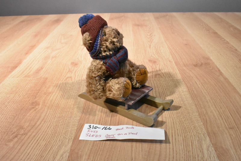 Russ Sleds Brown Teddy Bear Plush on a Wooden Sled