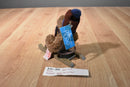 Russ Sleds Brown Teddy Bear Plush on a Wooden Sled