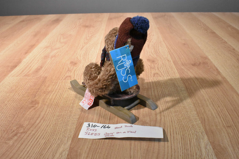 Russ Sleds Brown Teddy Bear Plush on a Wooden Sled