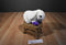 Travelers Insurance White Bunny Plush With a Purple Paw