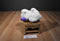 Travelers Insurance White Bunny Plush With a Purple Paw