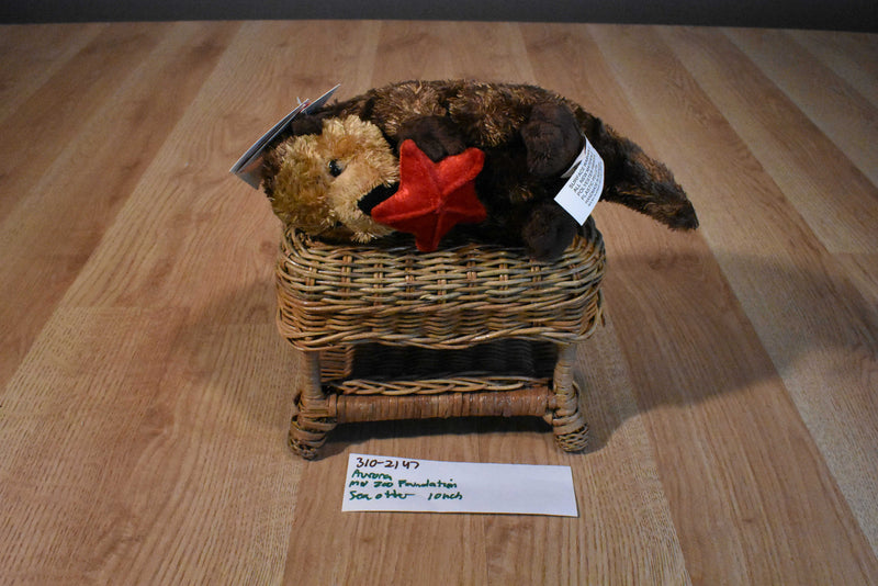 Aurora Mini Sea Otter Plush With a Red Sea Star