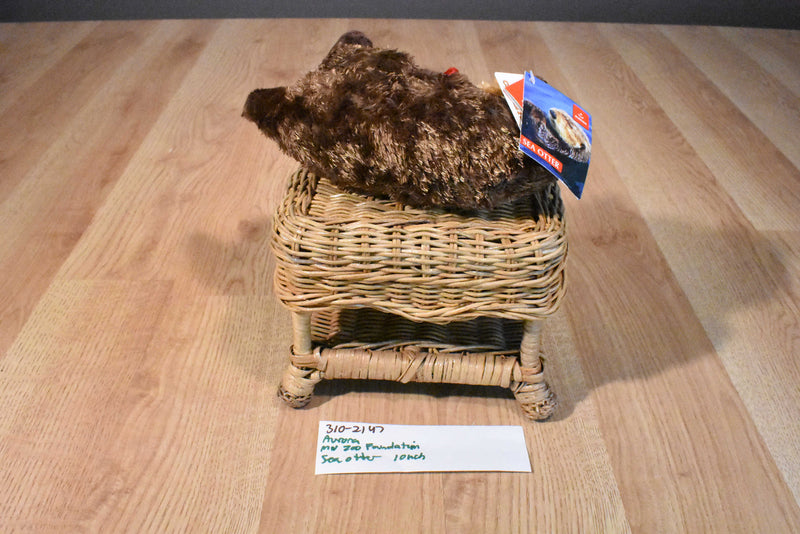 Aurora Mini Sea Otter Plush With a Red Sea Star