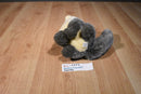Howling Grey and Beige Wolf Plush with Orange Eyes