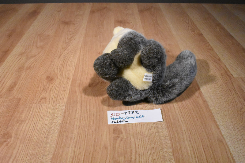 Howling Grey and Beige Wolf Plush with Orange Eyes
