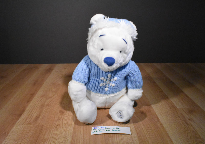 Disney Store Snowflake Pooh Plush in a Blue Sweater with a Snowflake