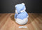 Disney Store Snowflake Pooh Plush in a Blue Sweater with a Snowflake