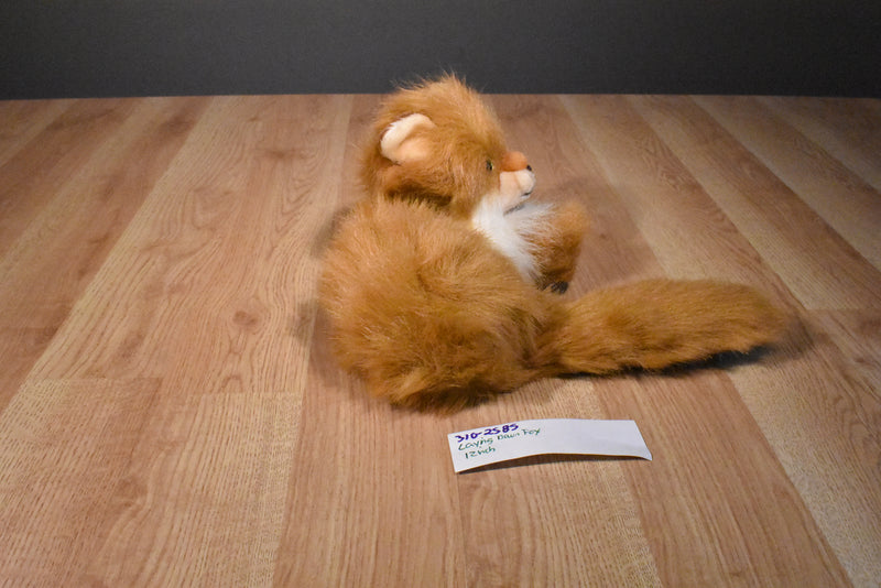 Red Fox Laying Down Plush with Yellow Eyes