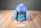 Disney Store Holiday Stitch Plush Wearing a Green Jacket/ Red Scarf