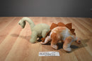 FAO Schwarz 4 Dinosaurs and Cave Carrier Plush