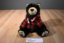 Black Bear Beanbag Plush Wearing a Red Plaid Hoodie