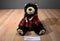 Black Bear Beanbag Plush Wearing a Red Plaid Hoodie