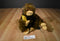 Plushland Brown and Beige Monkey 1999 Plush with a Yellow Banana