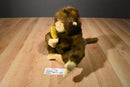 Plushland Brown and Beige Monkey 1999 Plush with a Yellow Banana