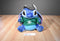 Disney Holiday Stitch Plush Wearing a Green Knit Sweater/Bomber Hat