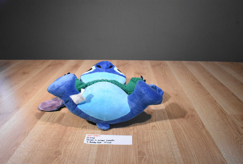 Disney Holiday Stitch Plush Wearing a Green Knit Sweater/Bomber Hat