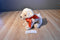 Melissa and Doug Sunny the Yellow Lab Puppy Dog Beanbag Plush With Red Bow