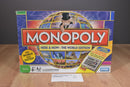 Monopoly Here and Now The World Edition 2008 Board Game - 90% Complete