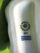 Royal Copenhagen White Porcelain Infant Baby Laying on Back Figurine